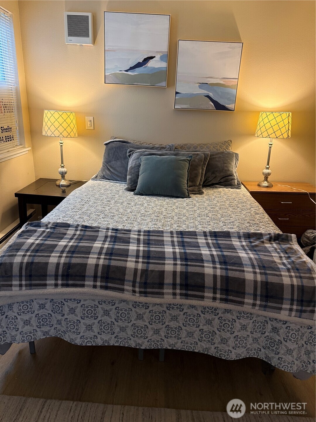 21301 52nd Avenue West, Unit B112 Mountlake Terrace, WA 98043 - Photo 12 of 17 a bedroom with a bed and a night stand