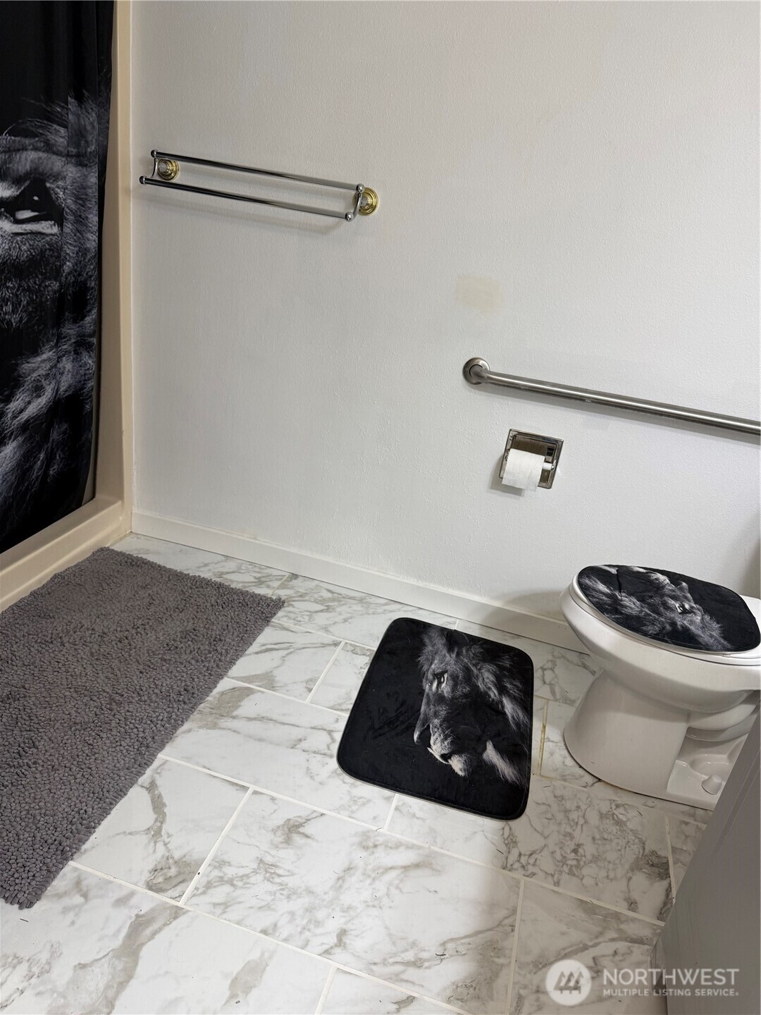 21301 52nd Avenue West, Unit B112 Mountlake Terrace, WA 98043 - Photo 14 of 17 a bathroom with a sink and a mirror