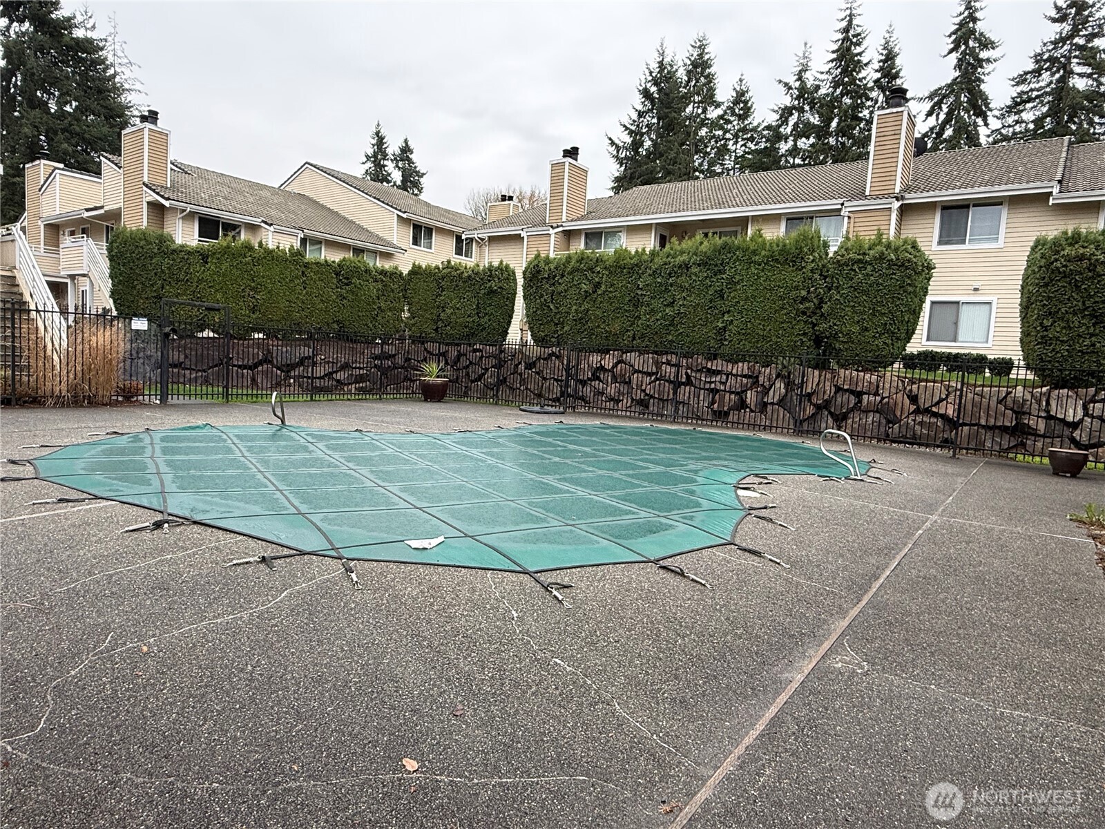 21301 52nd Avenue West, Unit B112 Mountlake Terrace, WA 98043 - Photo 17 of 17 a view of a house with a garden