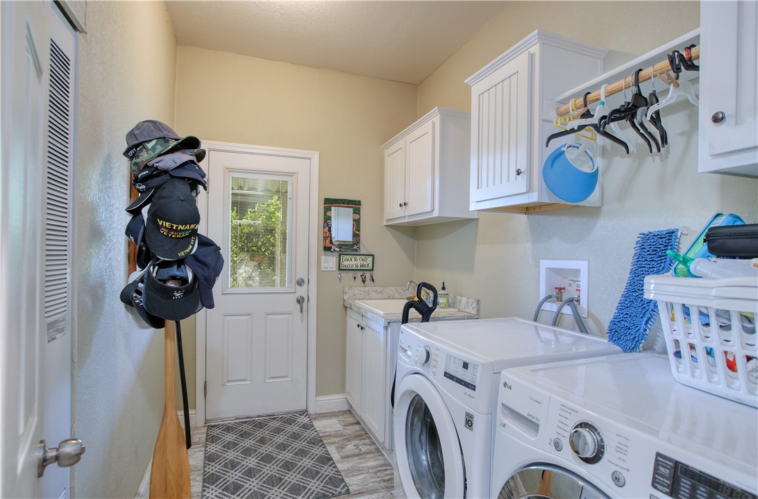 950 Huasna Road, Unit 37 Arroyo Grande, CA 93420 - Photo 21 of 43 Laundry room with utility sink and washer and dryer included.