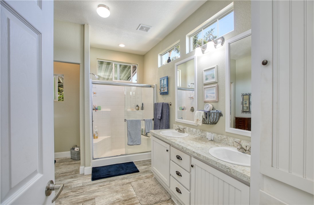 950 Huasna Road, Unit 37 Arroyo Grande, CA 93420 - Photo 31 of 43 Primary bath with dual sinks, walk in shower and walk in closet.