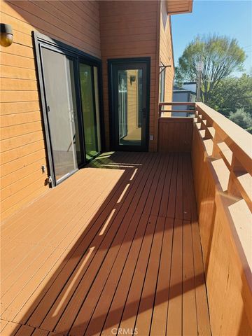 a kitchen with stainless steel appliances a refrigerator and a sink