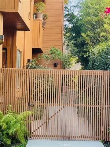 a view of a wooden fence