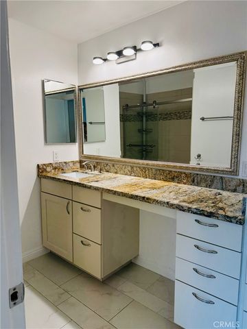 a bathroom with a shower and a toilet