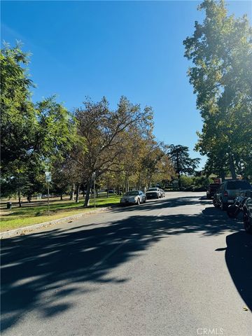 a park view with tall trees