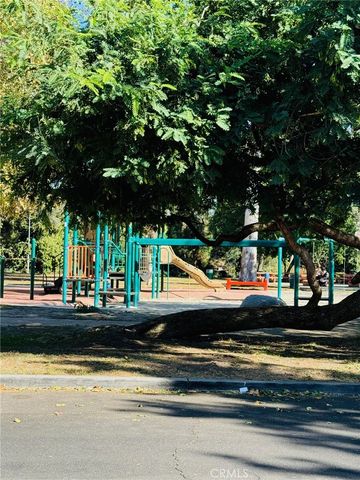 a view of swimming pool with trees in the background