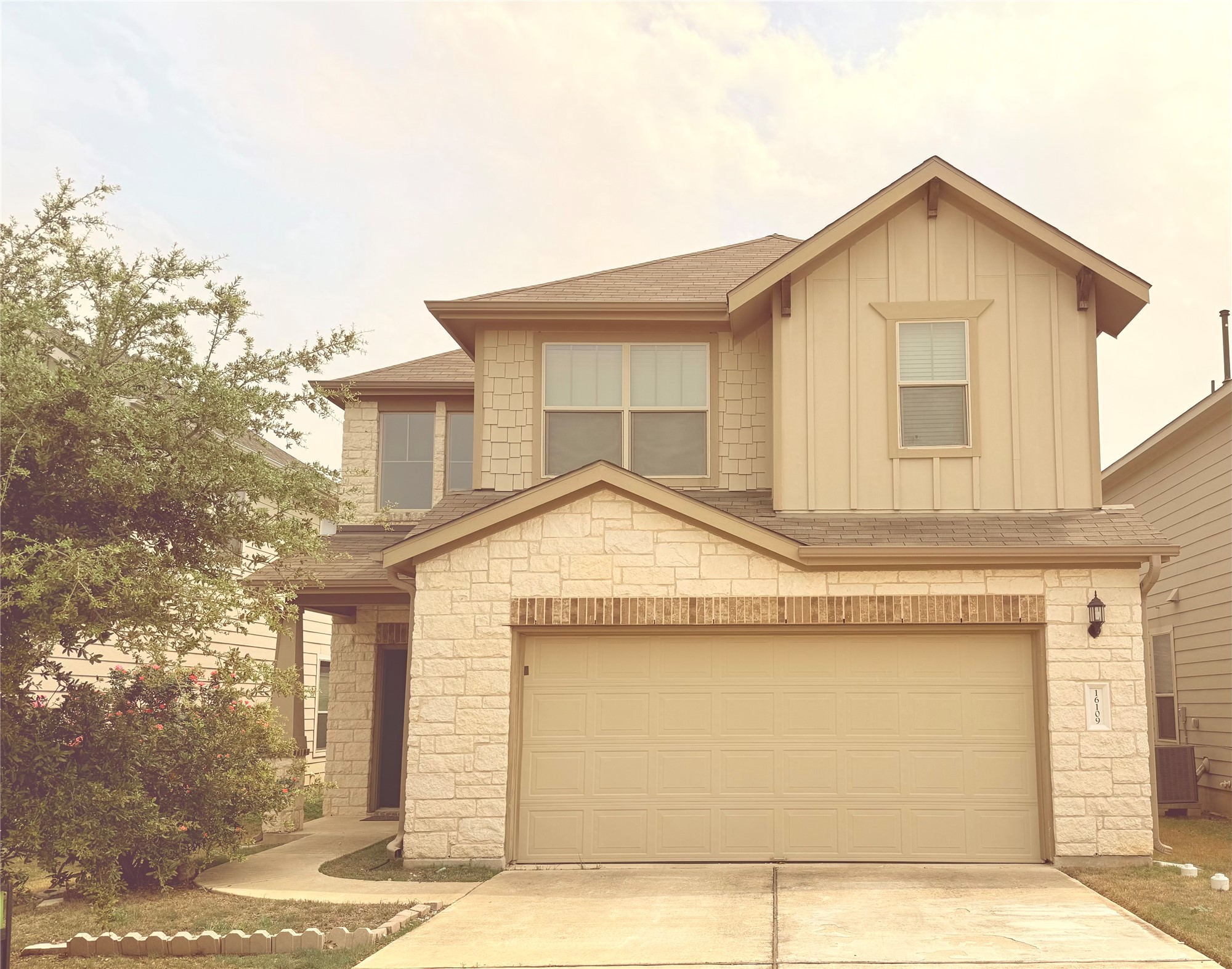 16109 Nightshade Street Austin, TX 78728 - Photo 1 of 24 a front view of a house with a garage