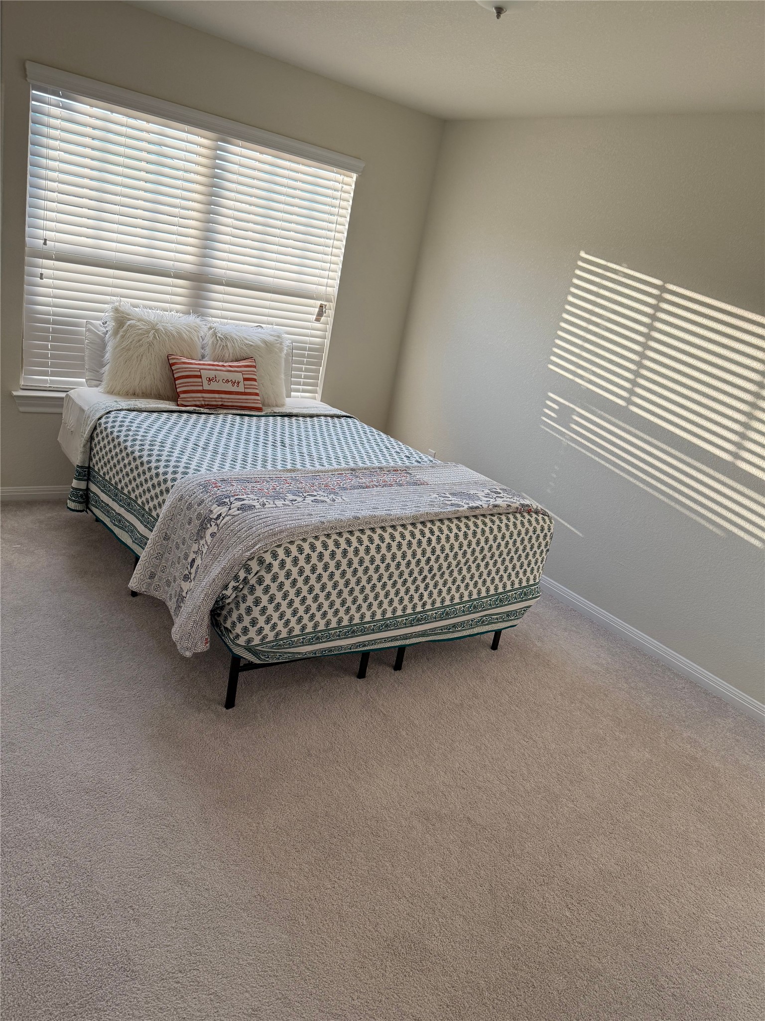 16109 Nightshade Street Austin, TX 78728 - Photo 13 of 24 a view of a bedroom with furniture and windows