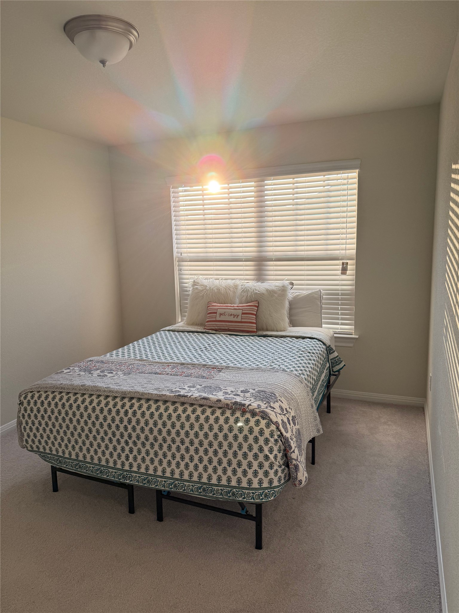 16109 Nightshade Street Austin, TX 78728 - Photo 14 of 24 a bed sitting in a room next to a window