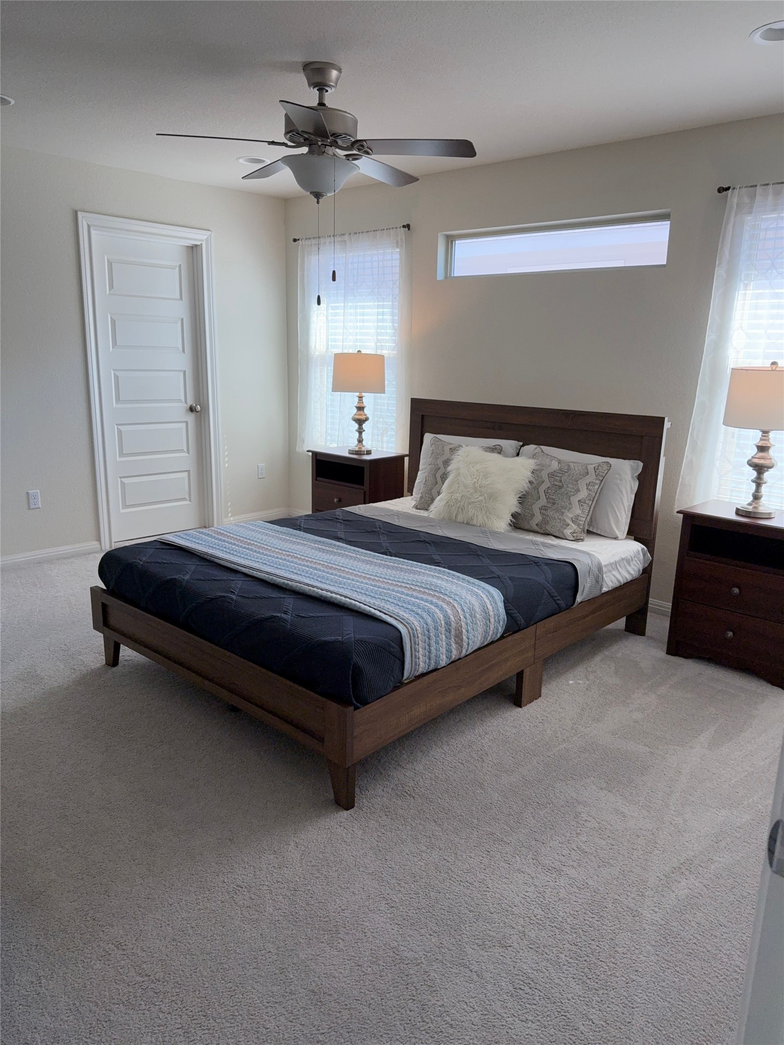 16109 Nightshade Street Austin, TX 78728 - Photo 17 of 24 a bedroom with a bed and window