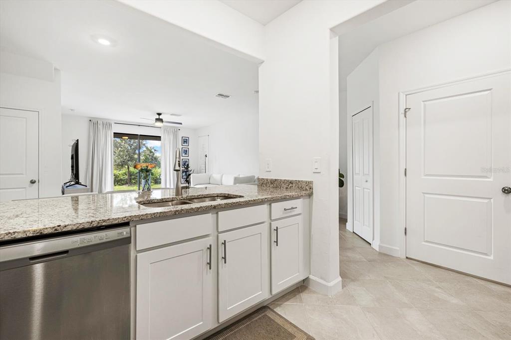 14812 Lyla Terrace Lakewood Ranch, FL 34211 - Photo 13 of 65 a bathroom with a granite countertop sink and a mirror