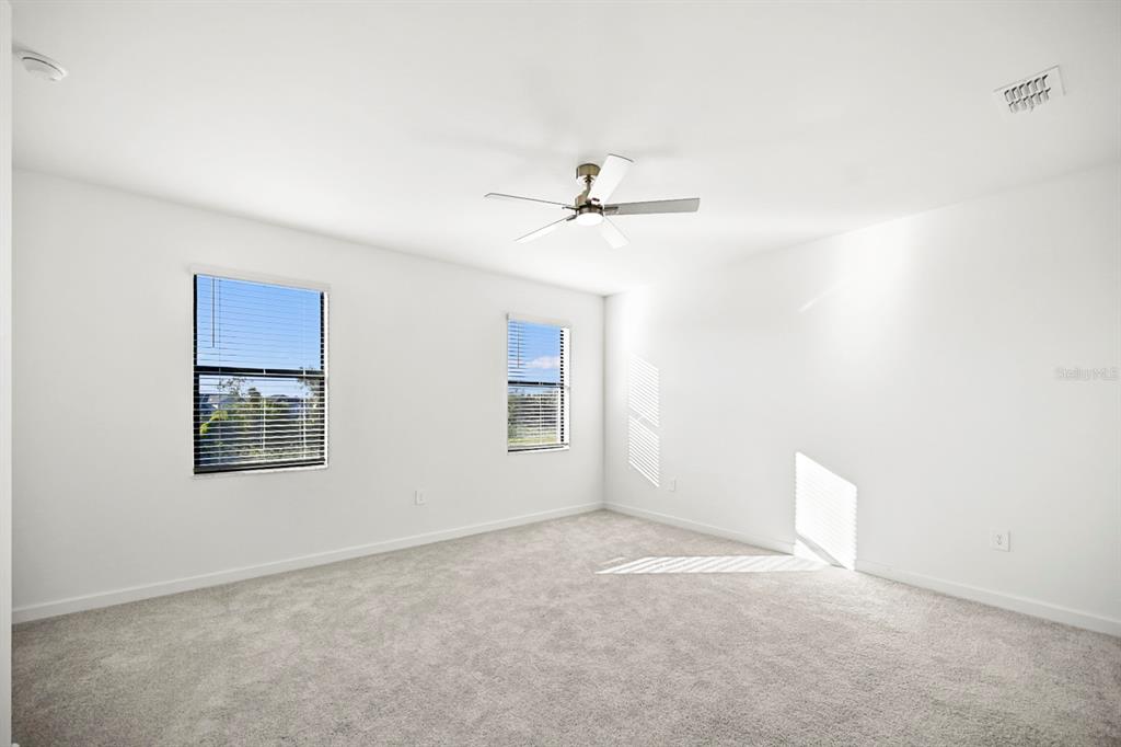 14812 Lyla Terrace Lakewood Ranch, FL 34211 - Photo 18 of 65 a view of an empty room with a window