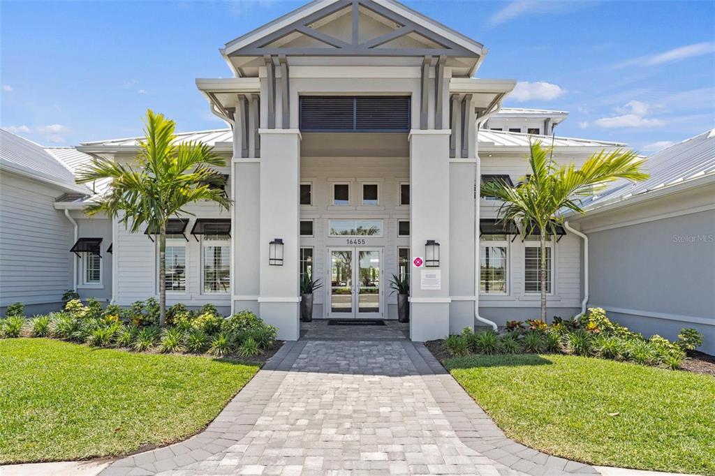 14812 Lyla Terrace Lakewood Ranch, FL 34211 - Photo 59 of 65 a front view of a house with garden