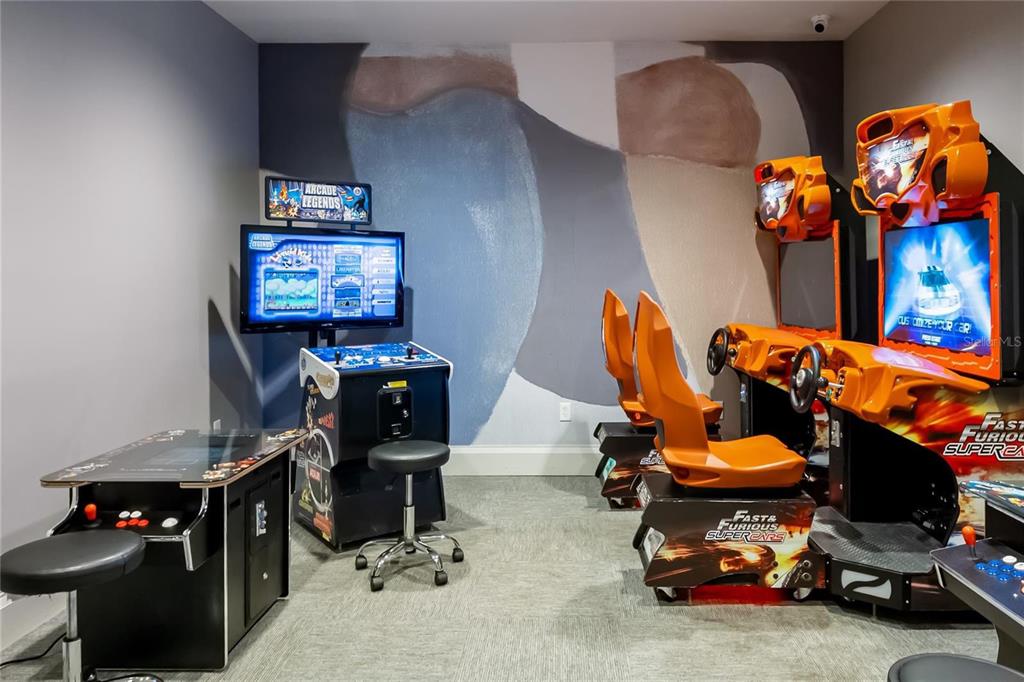 14812 Lyla Terrace Lakewood Ranch, FL 34211 - Photo 65 of 65 a room with furniture and gym equipment