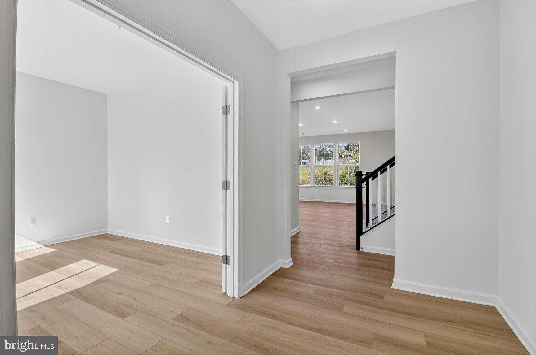 4016 Millner Road Nottingham, MD 21236 - Photo 6 of 15 a view of a hallway with wooden floor