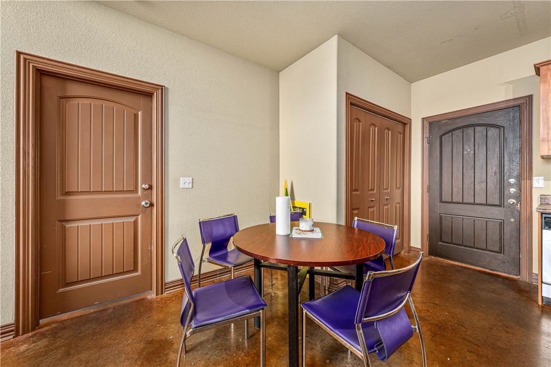 2410 2nd Street South Waco, TX 76706 - Photo 12 of 36 a view of a dining room with furniture and wooden floor