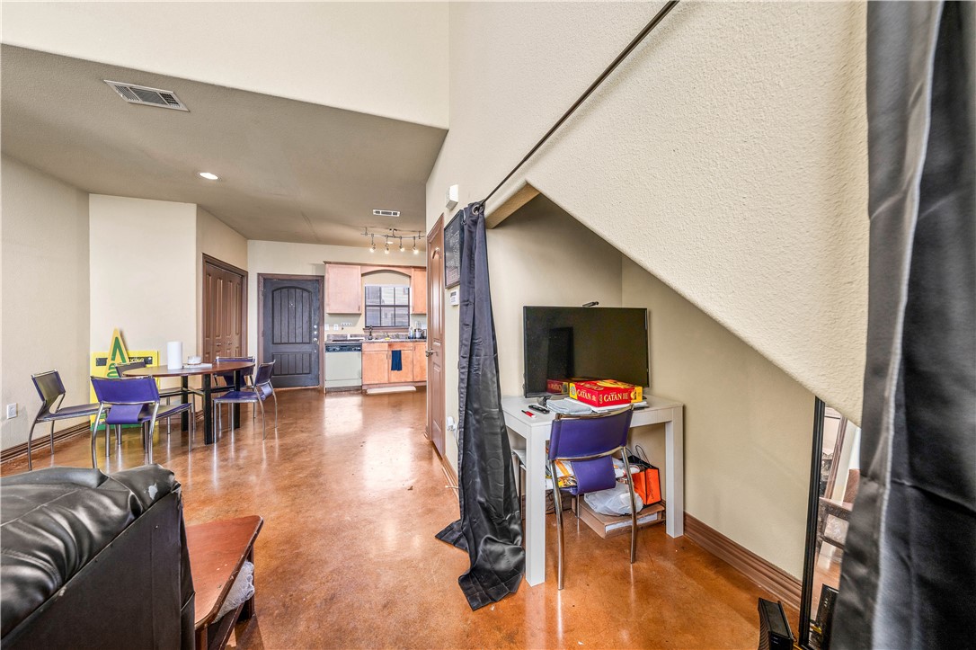 2410 2nd Street South Waco, TX 76706 - Photo 21 of 36 a living room with furniture and a wooden floor