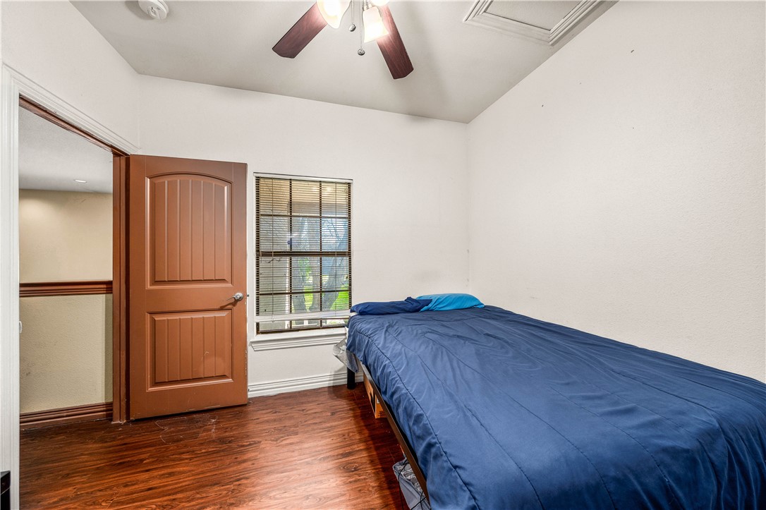 2410 2nd Street South Waco, TX 76706 - Photo 28 of 36 a bedroom with a bed and a window
