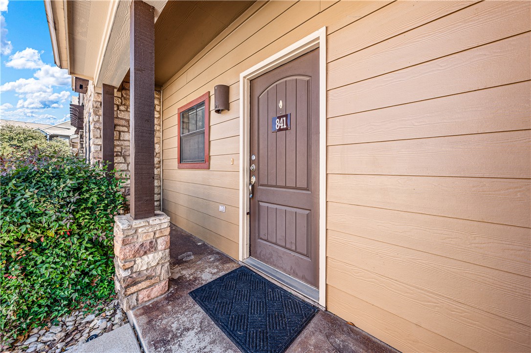 2410 2nd Street South Waco, TX 76706 - Photo 5 of 36 a view of a door and wooden floor