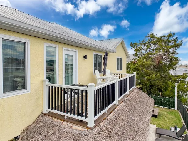 a dining room with furniture and a window