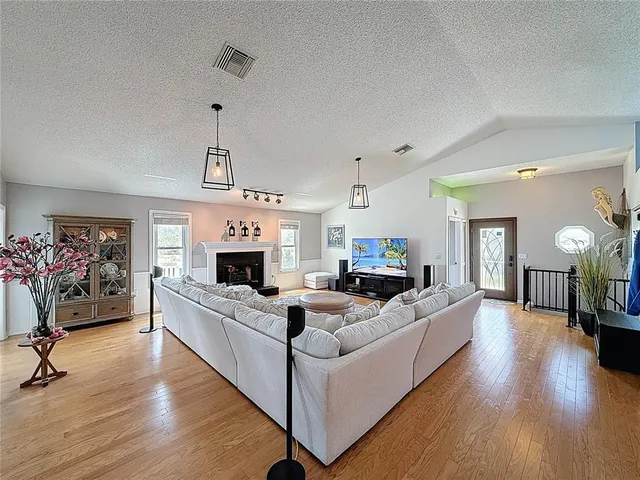 a workspace with furniture and wooden floor