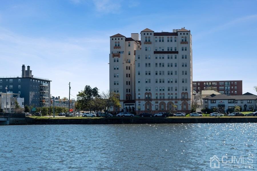 400 Deal Lake Drive, Unit 4G Asbury Park, NJ 07712 - Photo 2 of 20 a view of a city with tall buildings
