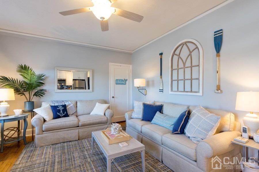400 Deal Lake Drive, Unit 4G Asbury Park, NJ 07712 - Photo 10 of 20 a living room with furniture