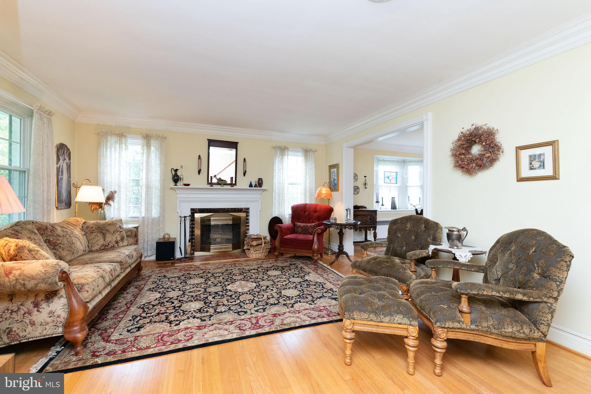 3713 Delverne Road Baltimore, MD 21218 - Photo 4 of 39 Living Room with a Wood Burning Fireplace