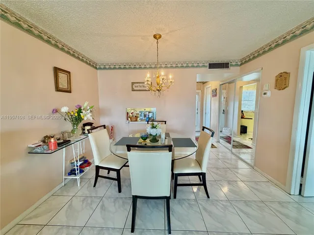 a view of a livingroom and dining room