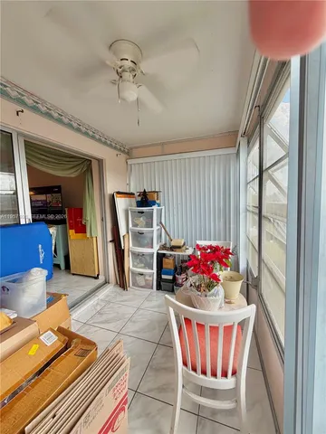 a room with furniture and a large window