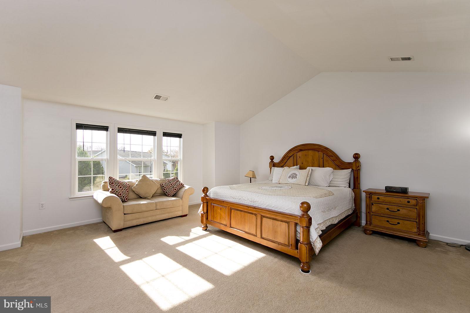 187 Shelby Road Inwood, WV 25428 - Photo 22 of 30 Large master bedroom with vaulted ceiling.