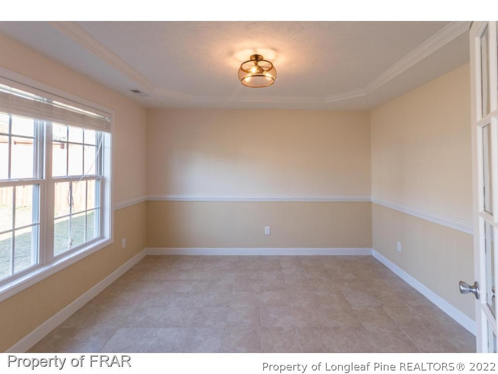 47 Rockingham Street Spring Lake, NC 28390 - Photo 12 of 27 a view of an empty room with a window