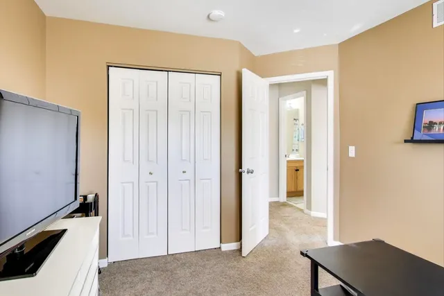 a view of a hallway with bathroom