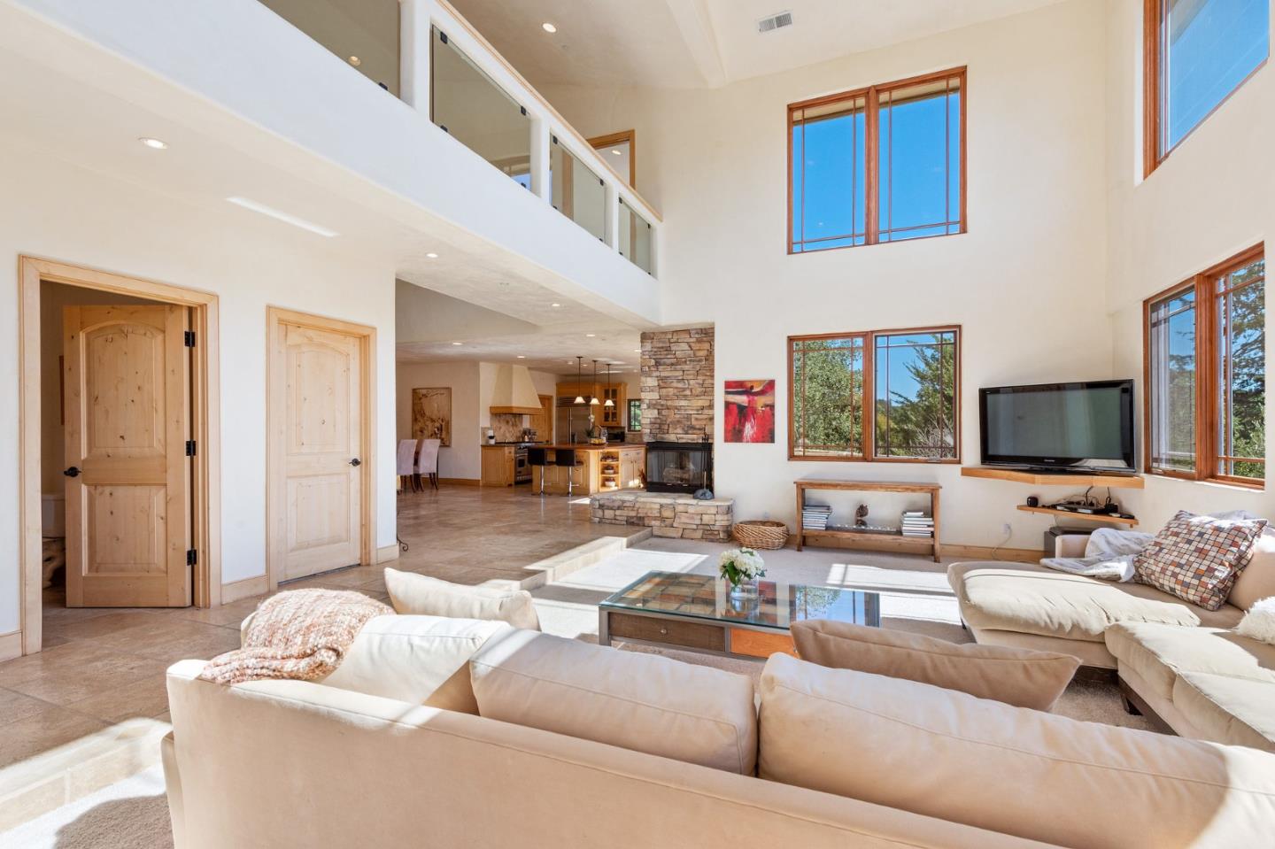 175 Chaparral Road Carmel Valley, CA 93924 - Photo 10 of 66 a living room with furniture or couch and a flat screen tv