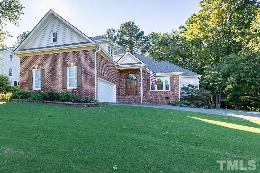 5021 Martin Farm Road Raleigh, NC 27613 - Photo 1 of 30 a front view of a house with yard