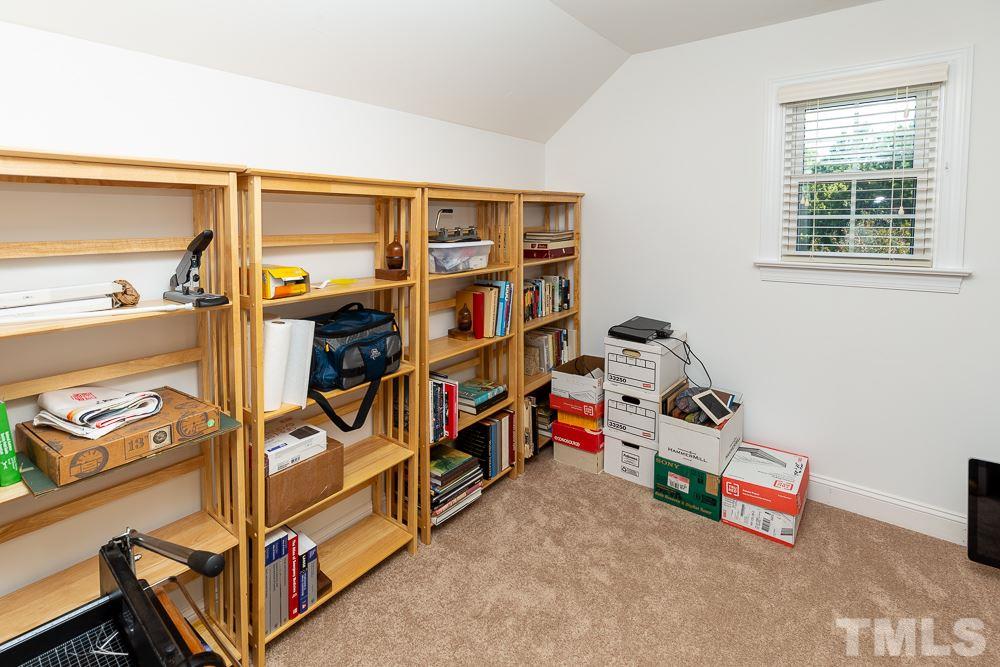 5021 Martin Farm Road Raleigh, NC 27613 - Photo 23 of 30 a room with storage and a white door