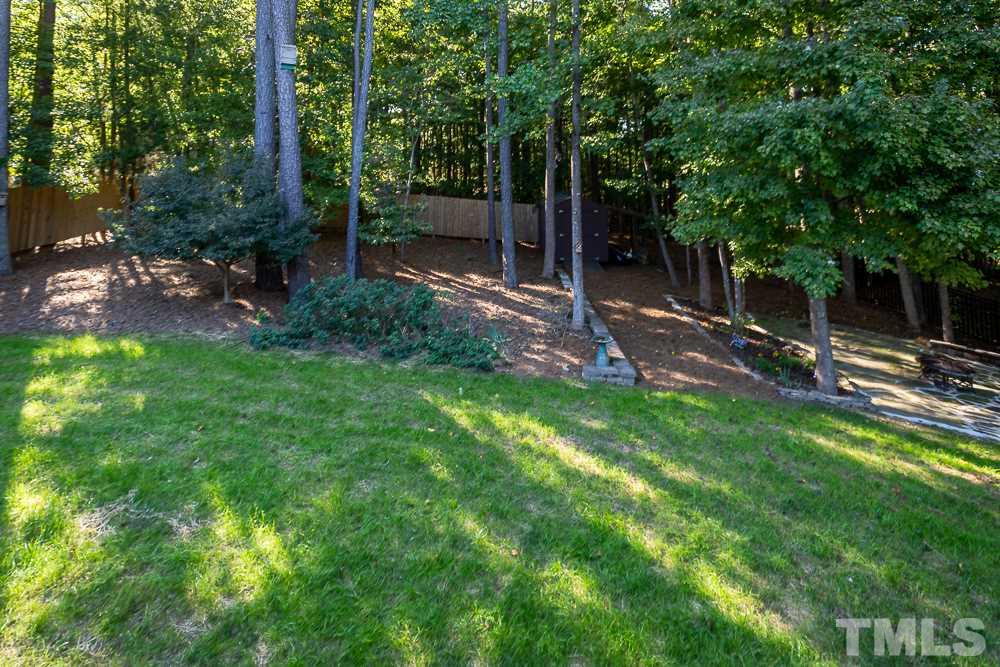 5021 Martin Farm Road Raleigh, NC 27613 - Photo 28 of 30 a view of a backyard