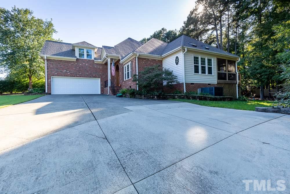 5021 Martin Farm Road Raleigh, NC 27613 - Photo 29 of 30 front view of house with a yard