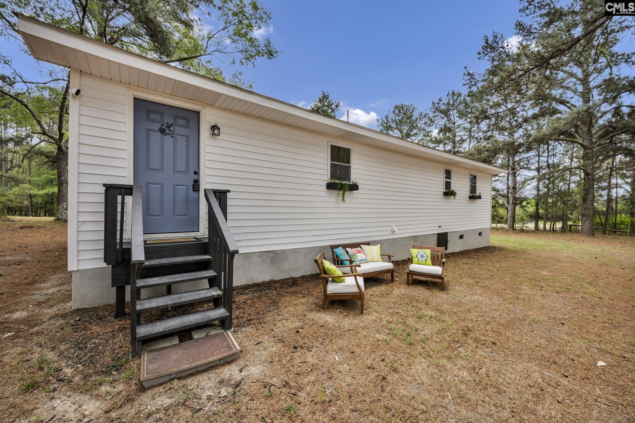 8107 Black River Road Rembert, SC 29128 - Photo 32 of 38 a view of outdoor space and yard