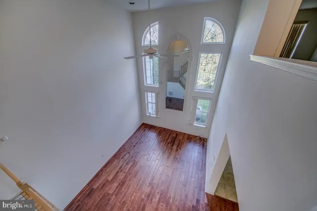 wooden floor in a hall with an entryway