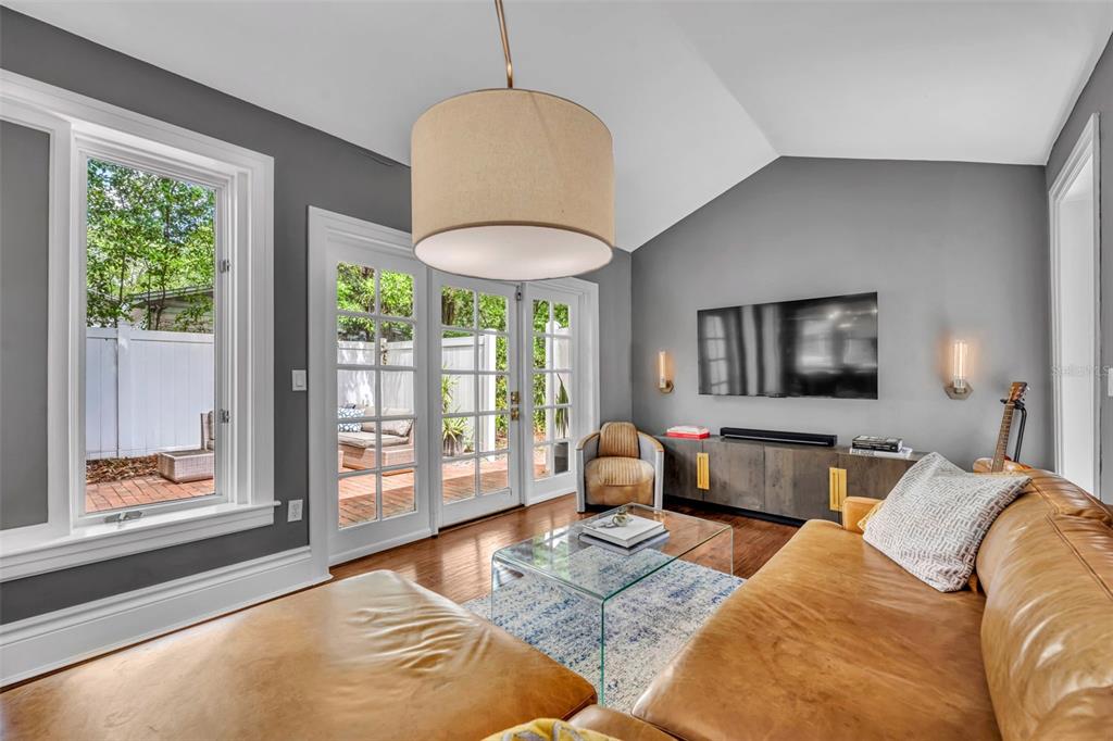 1960 Winter Park Road Winter Park, FL 32789 - Photo 13 of 46 a bedroom with bed and wooden floor