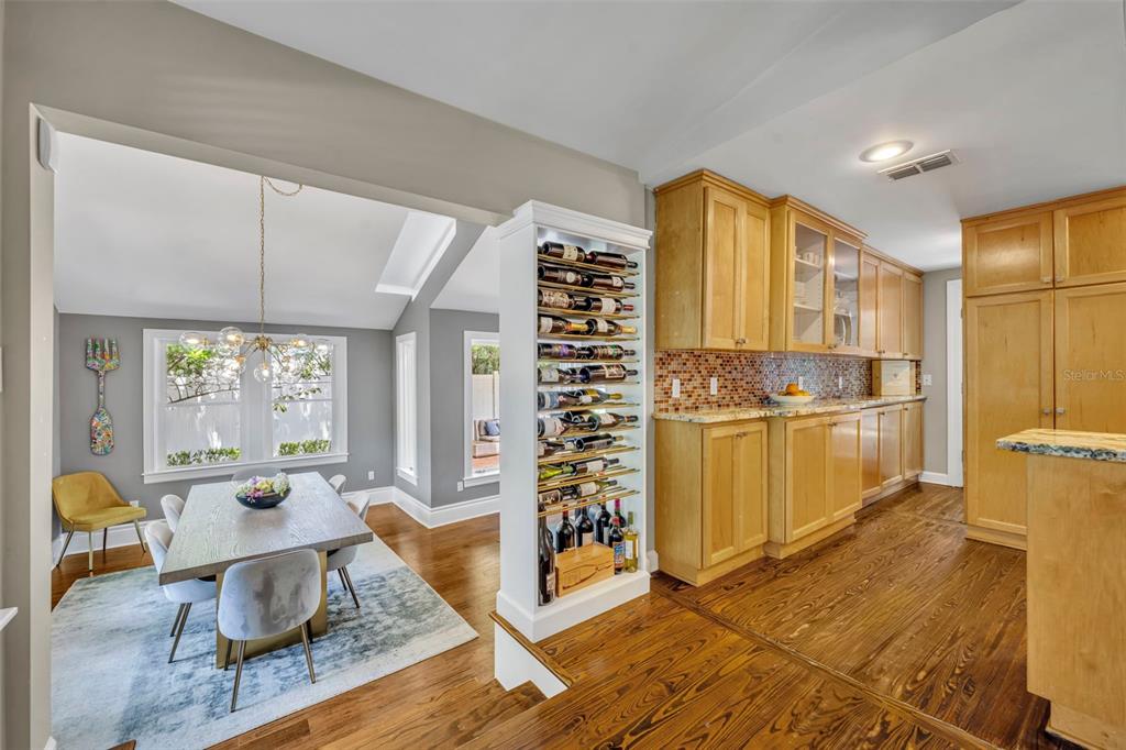 1960 Winter Park Road Winter Park, FL 32789 - Photo 16 of 46 a living room with blue lights with furniture and wooden floor