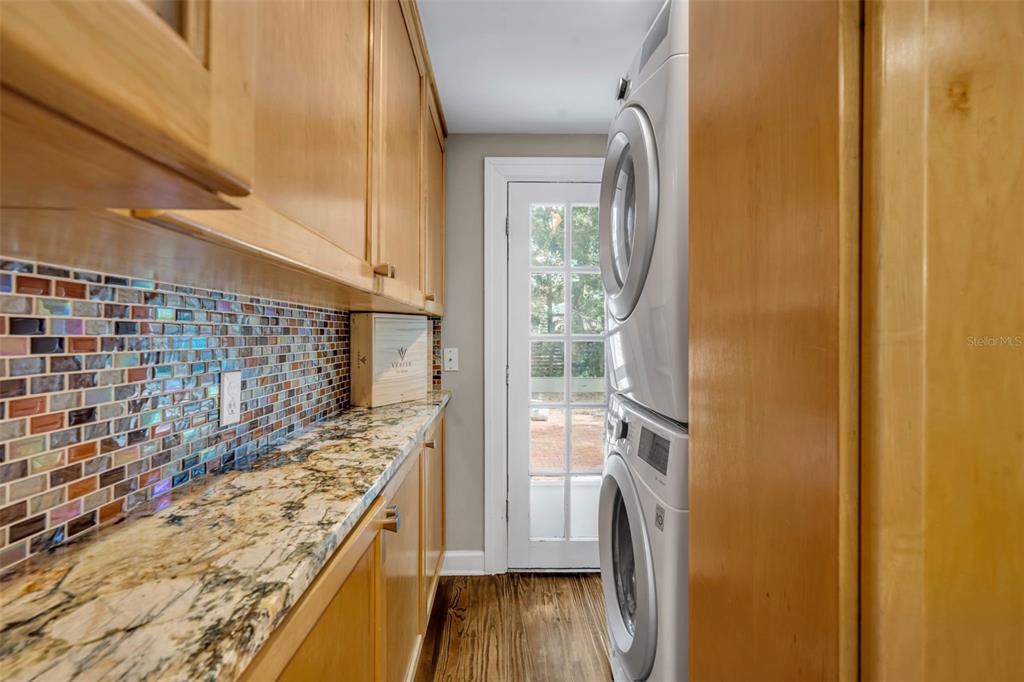 1960 Winter Park Road Winter Park, FL 32789 - Photo 22 of 46 a kitchen with a sink and refrigerator