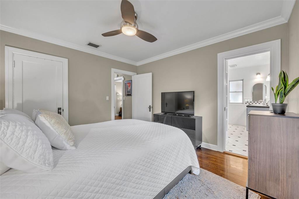 1960 Winter Park Road Winter Park, FL 32789 - Photo 24 of 46 a bedroom with a bed and a flat screen tv
