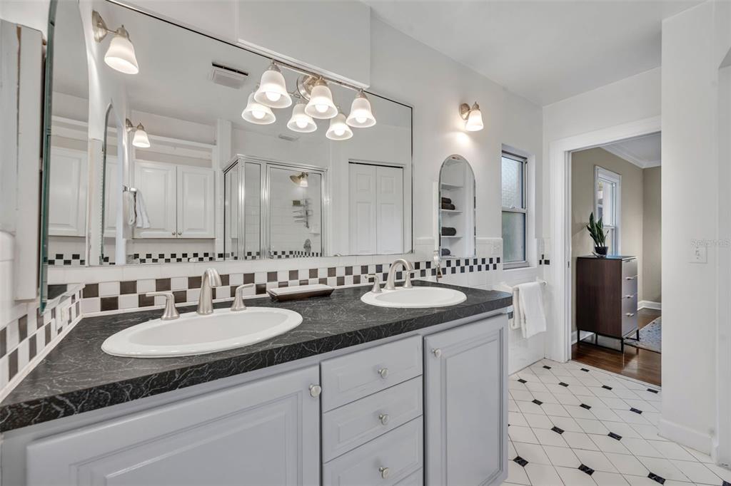 1960 Winter Park Road Winter Park, FL 32789 - Photo 26 of 46 a bathroom with a sink double vanity and a mirror