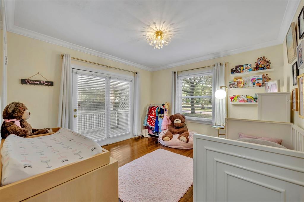 1960 Winter Park Road Winter Park, FL 32789 - Photo 27 of 46 a living room with furniture and a flat screen tv