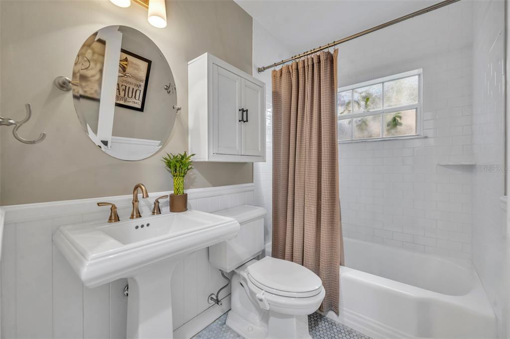 1960 Winter Park Road Winter Park, FL 32789 - Photo 29 of 46 a bathroom with a sink mirror and toilet