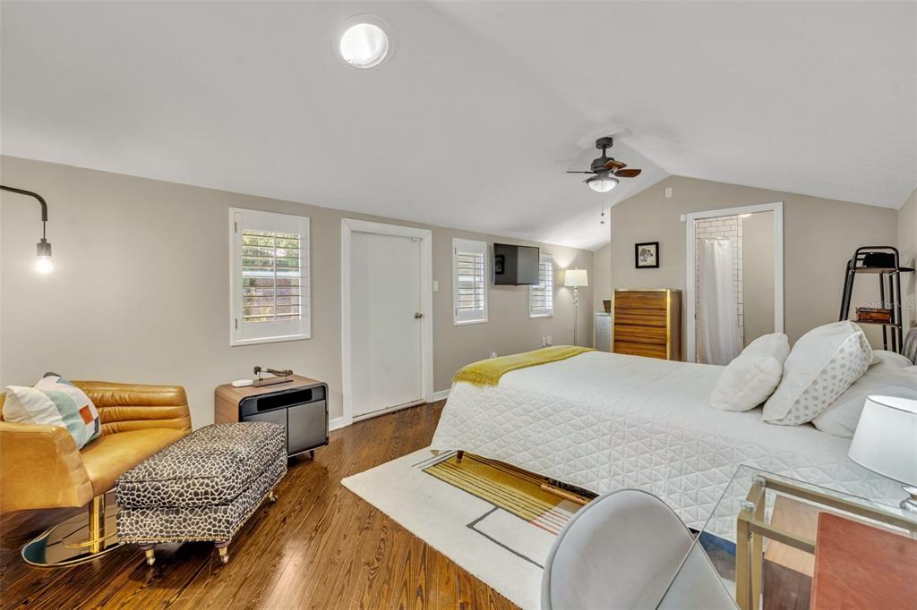 1960 Winter Park Road Winter Park, FL 32789 - Photo 39 of 46 a bedroom with a bed and wooden floor