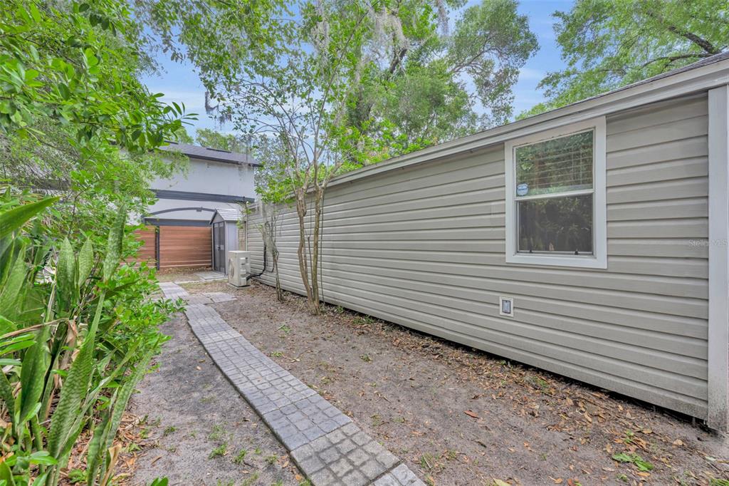 1960 Winter Park Road Winter Park, FL 32789 - Photo 42 of 46 a backyard of a house with plants and trees