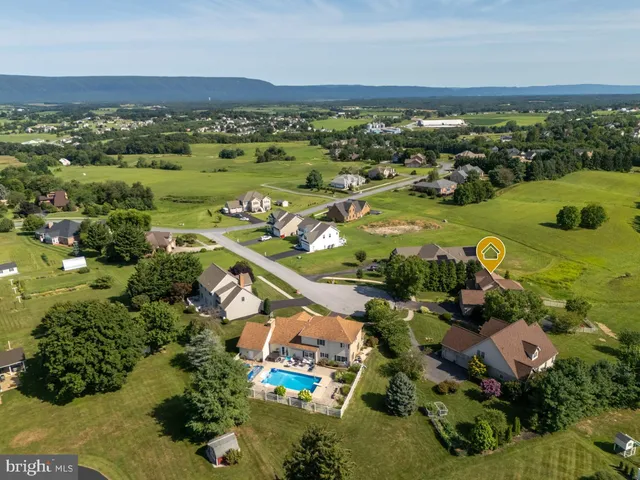 a kitchen with stainless steel appliances granite countertop a refrigerator sink and stove